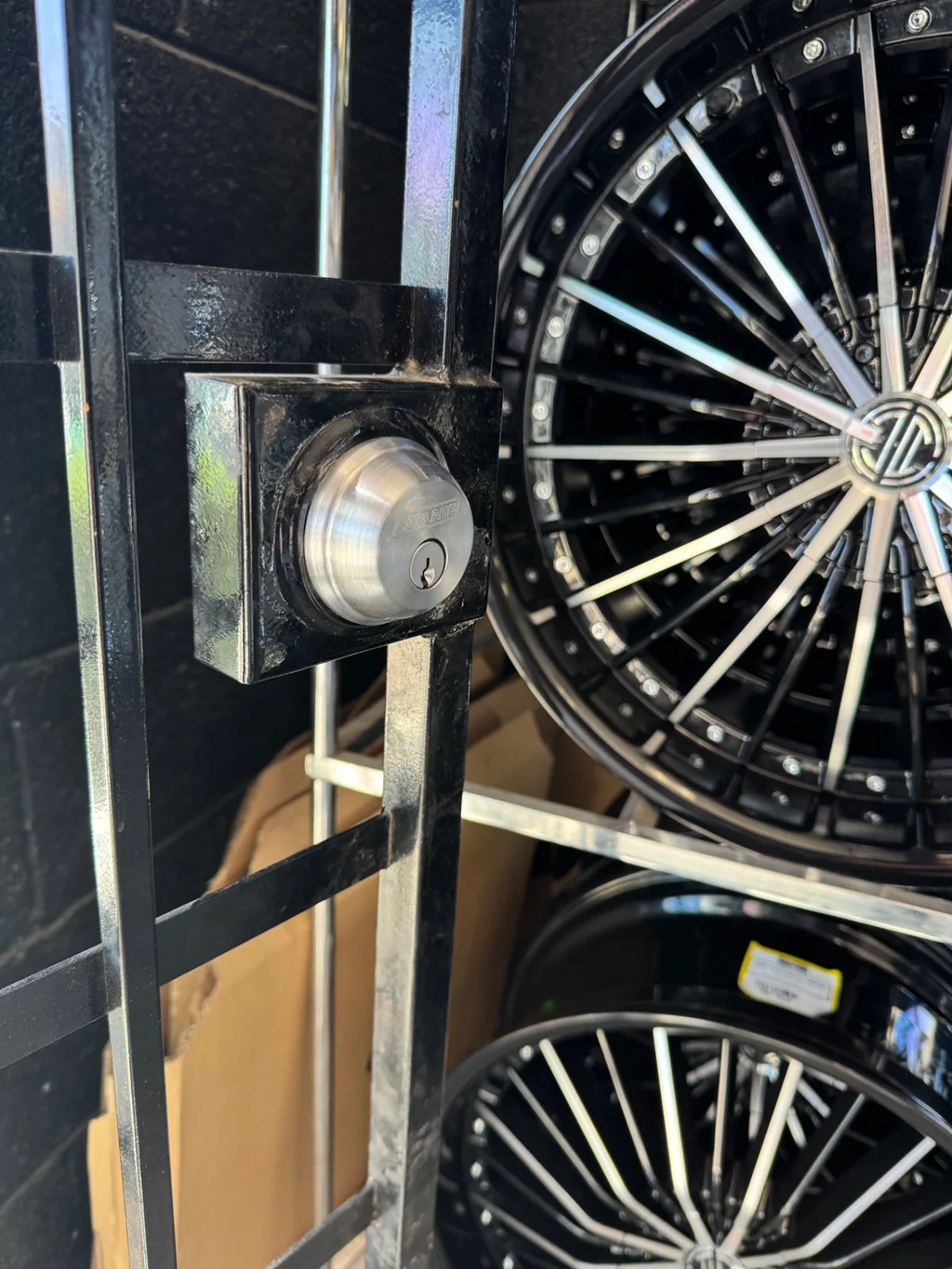 Newly installed Schlage deadbolt on a wrought-iron security gate after a real locksmith job