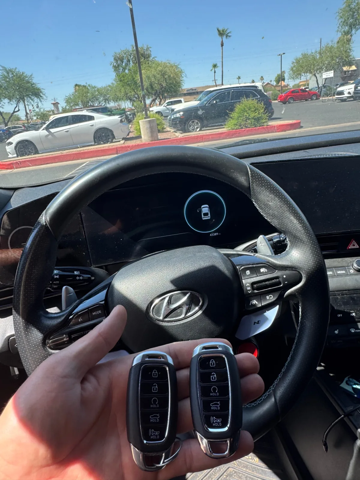 New Hyundai smart keys held inside a Hyundai after same-day replacement service