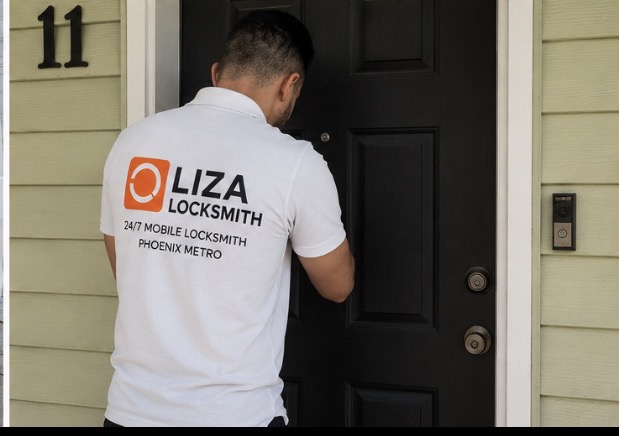 Liza Locksmith technician servicing a residential front door in Phoenix