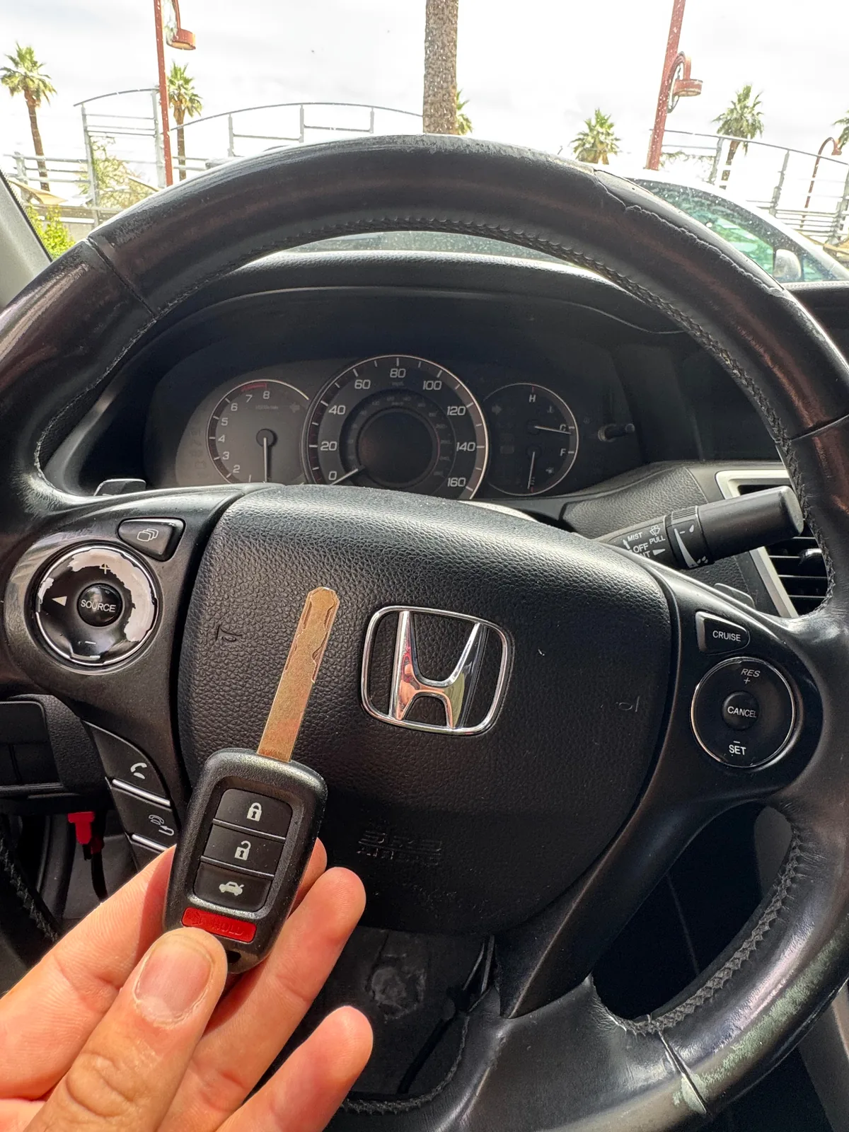 Replacement Honda-family vehicle key shown after on-site mobile locksmith service